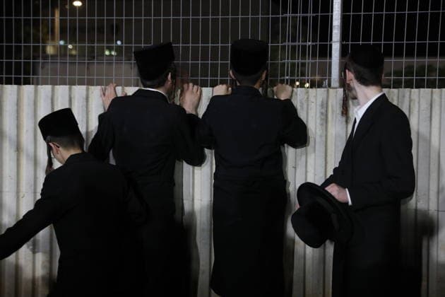 Ultra-Orthodox Jews protest compulsory military service outside Israeli prison KFAR YONA, ISRAEL - JULY 16: Demonstrators gather to protest outside the Beit Lid military prison demanding the release of an Ultra-Orthodox (Haredi) youth detained for refusing compulsory military service in Kfar Yona, Israel, on July 16, 2026. Gideon Markowicz Anadolu Kfar Yona Israel. Editorial use only. Please get in touch for any other usage.  Copyright: x2026xAnadoluxGideonxMarkowiczx