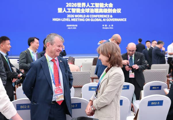 (260717) -- SHANGHAI, July 17, 2026 -- Guests talk with each other before the opening ceremony of the 2026 World AI Conference and High-Level Meeting on Global AI Governance in Shanghai, east China, July 17, 2026. ) CHINA-SHANGHAI-2026 WORLD AI CONFERENCE-OPENING (CN) HuangxJingwen 