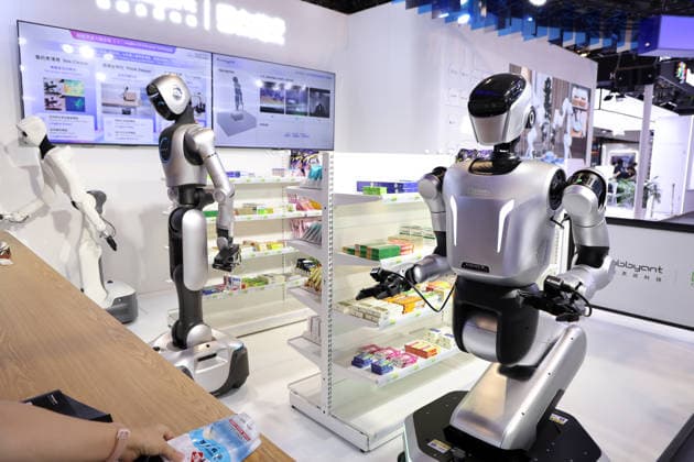 SHANGHAI, CHINA - JULY 17: Humanoid robots retrieve medicine for customers at a smart pharmacy during the 2026 World AI Conference and High-Level Meeting on Global AI Governance on July 17, 2026 in Shanghai, China. Themed AI Partnership for a Brighter Future, the event will include more than 140 forums, bringing together 1,400 guests from home and abroad.  Copyright: xChinaxNewsxServicex 111654825182