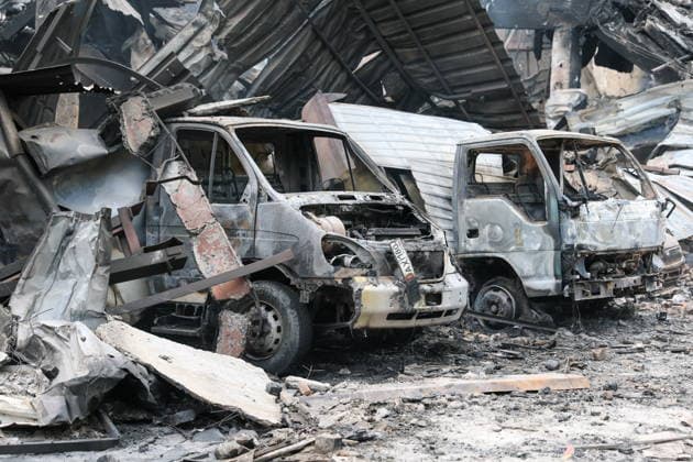 RUSSIA, GORLOVKA - JULY 17, 2026: A view of burnt-out cars at a warehouse building at Diad Confectionery Factory after a Ukrainian military strike. Dmitry Yagodkin TASS  95132385