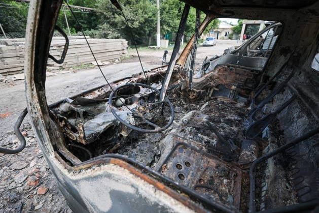 RUSSIA, GORLOVKA - JULY 17, 2026: A burnt-out vehicle at a warehouse building at Diad Confectionery Factory after a Ukrainian military strike. Dmitry Yagodkin TASS  95132569