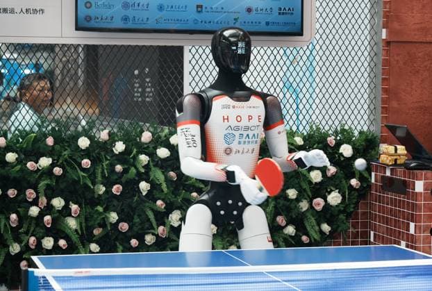 2026 WAIC Held in Shanghai SHANGHAI, CHINA - JULY 17, 2026 - An intelligent humanoid robot competed in a table tennis match with the audience at the 2026 World Artificial Intelligence Conference in Shanghai, China on July 17, 2026. Shanghai Shanghai China  Copyright: xCFOTOx i1784302543269