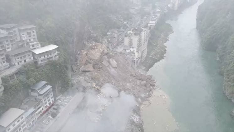 RECORD DATE NOT STATED 270764.jpg Drone image of a massive landslide caused multiple buildings to collapse near the Wujiang Three Bridges in Pengshui, Chongqing, China, on Friday July 17, 2026. State media says a landslide in the southwestern Chinese city of Chongqing has buried some residential buildings, trapping an undetermined number of people. A landslide Friday in the southwestern Chinese city of Chongqing buried some residential buildings, trapping an undetermined number of people, state media reported. State broadcaster CCTV said at least eight people were rescued from the debris, and that search and rescue operations were ongoing. CCTV said the landslide occurred at around 9:08 a.m. in Chongqing EDITORIAL USE ONLY  Copyright: xx 270764 x eyepress127281