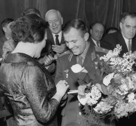 Moscow, USSR. Soviet poetess Veronika Tushnova presents her collection of poems to the first person in space, commander of the Soviet cosmonaut detachment, Hero of the Soviet Union, Soviet cosmonaut Yuri Gagarin (L-R front) at a meeting of Yuri Gagarin with Soviet writers at the Central House of Writers. Soviet children s writer and poet Korney Chukovsky (C back), Soviet poet Yevgeny Dolmatovsky (2nd R back), and Soviet writer Valentin Katayev (R back) also attend the meeting. The negative is stored at the Russian State Archive of Scientific and Technical Documentation under No. 1-13609. Vladimir Savostyanov TASS  95129942