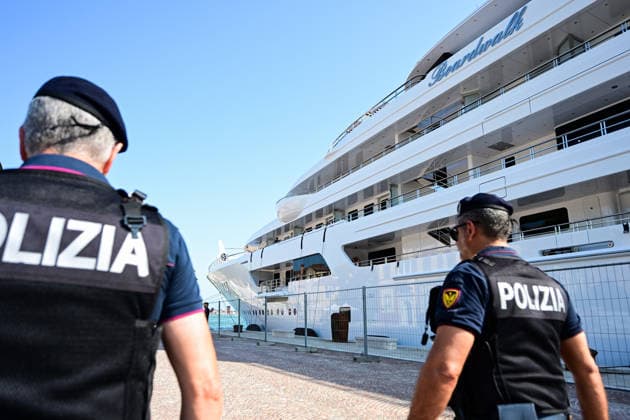 Protest against the visit of US Ambassador to Italy Tilman Fertitta in Venice, Italy VENICE, ITALY - JULY 17: Police officers walk in front of US Ambassador to Italy Tilman Fertitta’s 117-metre megayacht moored in Venice, Italy, on July 17, 2026 ahead of a protest opposing Fertitta s visit during the city s annual Redentore festival and criticized mass tourism, the influence of billionaires on Venice, and US policies under President Donald Trump. Piero Cruciatti Anadolu Veneto Italy. Editorial use only. Please get in touch for any other usage.  Copyright: x2026xAnadoluxPieroxCruciattix