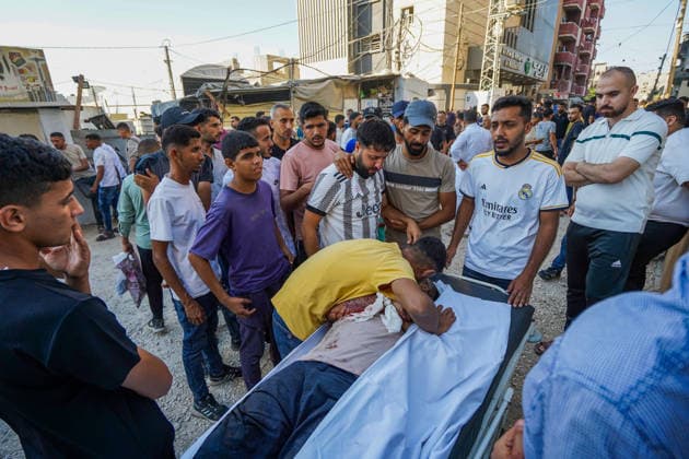Eight Palestinians killed, 20 injured in Israeli strike on funeral gathering in Gaza JABALIA, GAZA, PALESTINE - JULY 17: Palestinians mourn as the bodies of those killed are taken from the morgue of Al-Awda Hospital for burial after an Israeli strike targeted civilians gathered outside the Al-Awda Hospital for other Palestinians funeral, in Jabalia, Gaza, Palestine on July 17, 2026. The attack killed eight people and injured 20 others. Adam Bilal Anadolu Jabalia Gaza. Editorial use only. Please get in touch for any other usage.  Copyright: x2026xAnadoluxAdamxBilalx