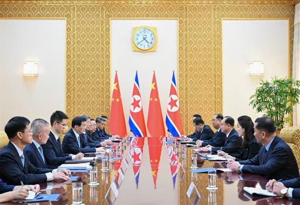 (260717) -- PYONGYANG, July 17, 2026 -- Wang Huning, a member of the Standing Committee of the Political Bureau of the Communist Party of China (CPC) Central Committee and chairman of the National Committee of the Chinese People s Political Consultative Conference (CPPCC), holds talks with Jo Yong Won, director of the Organizational Leadership Department of the Central Committee of the Workers Party of Korea (WPK), also a member of the Presidium of the Political Bureau of the Central Committee of the WPK and secretary of the WPK Central Committee, in Pyongyang, the Democratic People s Republic of Korea (DPRK), July 15, 2026. Wang led a party and government delegation to the DPRK for an official goodwill visit from Wednesday to Friday at t 