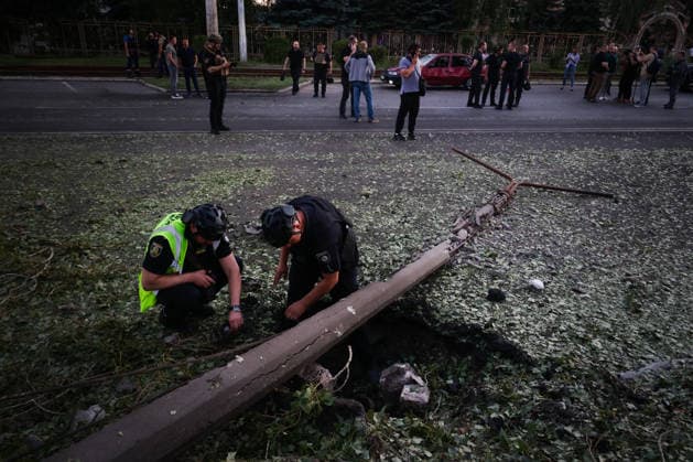 The aftermath of a Russian Banderol missile hitting the road in Kharkiv KHARKIV, UKRAINE - JULY 17: Ukrainian law enforcement officers inspect the crater and debris of a missile in Kharkiv, Ukraine on July 17, 2026. A Russian Banderol missile hit a road in Kharkiv. The missile strike injured nine people and killed one. Sofiia Bobok Anadolu Kharkiv Ukraine. Editorial use only. Please get in touch for any other usage.  Copyright: x2026xAnadoluxSofiiaxBobokx