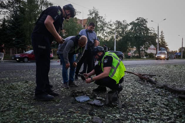 The aftermath of a Russian Banderol missile hitting the road in Kharkiv KHARKIV, UKRAINE - JULY 17: Ukrainian law enforcement officers inspect the crater and debris of a missile in Kharkiv, Ukraine on July 17, 2026. A Russian Banderol missile hit a road in Kharkiv. The missile strike injured nine people and killed one. Sofiia Bobok Anadolu Kharkiv Ukraine. Editorial use only. Please get in touch for any other usage.  Copyright: x2026xAnadoluxSofiiaxBobokx