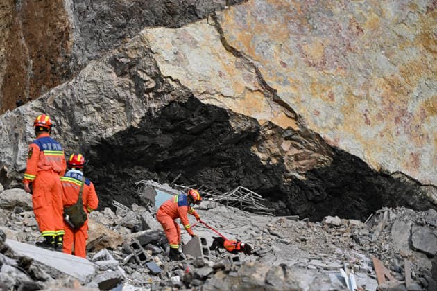 CHONGQING, CHINA - JULY 17: Rescue workers with search dogs conduct operations at a landslide site on July 17, 2026 in Chongqing, China. A landslide occurred along the Wujiang River in Handa Street, Pengshui Miao and Tujia Autonomous County, burying several residential buildings and trapping people; emergency and fire departments are conducting rescue operations.  Copyright: xChinaxNewsxServicex 111654894993