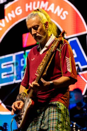 17.07.2026, Bellinzona, Parco Urbano, Nevermind Music Fest 2026: Modena City Ramblers, Massimo Ice Ghiacci (bass, sax, backing vocals, acoustic guitar) Bellinzona Parco Urbano Ticino Switzerland *** July 17, 2026, Bellinzona, Parco Urbano, Nevermind Music Fest 2026 Modena City Ramblers, Massimo Ice Ghiacci—bass, sax, backing vocals, acoustic guitar—Bellinzona, Parco Urbano, Ticino, Switzerland Copyright: xJustPictures.ch FrancescoxMinghettix jp-en-FrMi-_NG_0159