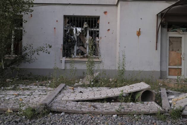 July 17, 2026, Kharkiv, Kharkiv-Oblast, UKRAINE: A residential building in kharkiv s Shevchenkivskyi District bears extensive shrapnel damage across its white facade following a russian Banderol missile strike on July 17, 2026. The barred window reveals internal destruction, while debris, concrete slabs, and vegetation growth litter the ground in front. The attack killed a 40-year-old man in his vehicle and wounded seven others who were hospitalized. Kharkiv UKRAINE  - ZUMAt164 20260717_zip_t164_021 Copyright: xYevhenxTitovx