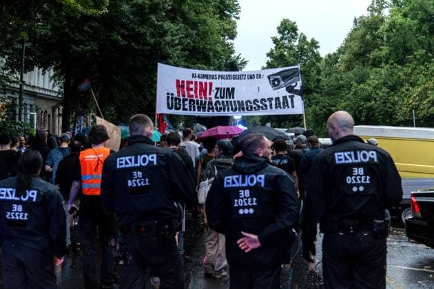 Protest Held Against AI Surveillance Measures in Berlin BERLIN, GERMANY JULY 17, 2026: Demonstrators take part in a protest against the deployment of an AI-assisted police surveillance system in Berlin on July 17, 2026. The system, introduced in selected areas of the city, is designed to analyze video footage and detect what authorities describe as suspicious behavior. Critics argue the technology expands state surveillance, raises privacy concerns and risks discriminatory policing and the criminalization of marginalized communities. Berlin Germany Copyright: x xAndrÃ sxTrujillox xJNAxPressx