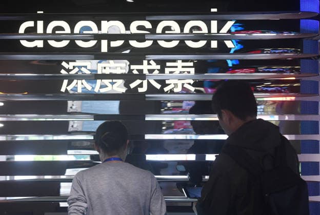 (260718) -- HANGZHOU, July 18, 2026 -- People learn about AI model DeepSeek at a fair themed on AI technologies in Hangzhou, east China s Zhejiang Province, May 4, 2025. (Photo by Xinhua) Xinhua Headlines: Smart tech, better lives: AI empowers China s common prosperity drive LongxWei 