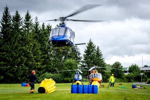 Storbrann i Drammen Sandefjord 20260718. Slokkeinnsatsen etter storbrannen i Krokstadelva fortsetter lordag formiddag. Foto: Trond R. Teigen NTB Sandefjord Norge mZRooIbhs4Y EDITORIAL USE ONLY Ref:_BNCmZRooIbhs4Y.jpg *** Major Fire in Drammen, Sandefjord, July 18, 2026 Firefighting efforts following the major fire in Krokstadelva continue Saturday morning. Photo: Trond R. Teigen, NTB, Sandefjord, Norway. mZRooIbhs4Y EDITORIAL USE ONLY Ref BNCmZRooIbhs4Y jpg  Copyright: xTrondxR.xTeigenx xNTBx