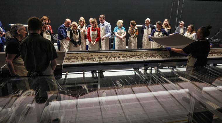 The Bayeux tapestry 17.07.2026. The French culture minister (L) Catherine Degard has part of the Bayeux tapestry explained to her by a French curator as The British Museum chairman George Osborne (R) looks on. They were looking at the tapestry after it was uncovered and laid flat behind the 70 meter long glass box that has been made for it to be secured in for public viewing later this year.  Copyright: xRichardxPohlex NINTCHDBPICT001095917311