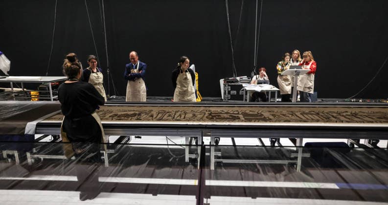 The Bayeux tapestry 17.07.2026. The Bayeux tapestry is laid flat and gently uncovered by French and British conservators behind the 70 meter long glass case that it will be displayed in at The British Museum.  Copyright: xRichardxPohlex NINTCHDBPICT001095917314