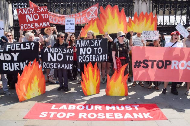 July 18, 2026, London, England, United Kingdom: Activists from Fossil Free London stage a protest outside the parliament calling on incoming Prime Minister Andy Burnham to stop the Rosebank oil and gas field in the North Sea. London United Kingdom  - ZUMAv130 20260718_zip_v130_014 Copyright: xVukxValcicx