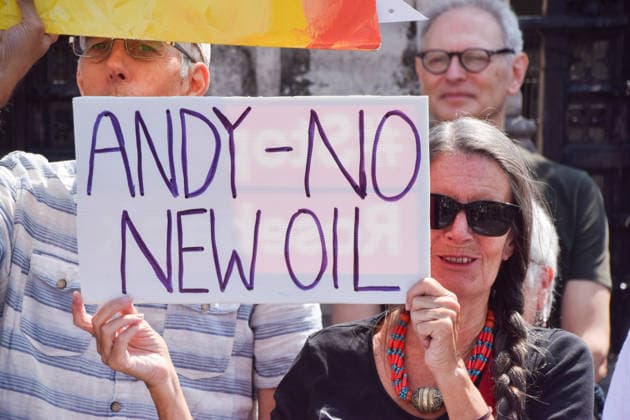 July 18, 2026, London, England, United Kingdom: Activists from Fossil Free London stage a protest outside the parliament calling on incoming Prime Minister Andy Burnham to stop the Rosebank oil and gas field in the North Sea. London United Kingdom  - ZUMAv130 20260718_zip_v130_015 Copyright: xVukxValcicx
