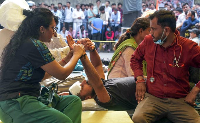 A man who was on hunger strike being checked by a doctor during a protest on alleged irregularities in the NEET examination New Delhi, Jul 18 (ANI): A man who was on hunger strike being checked by a doctor during a protest on alleged irregularities in the NEET examination at Jantar Mantar, in New Delhi on Saturday. NEW DELHI Delhi India Copyright: xANIx ANI_20260718402