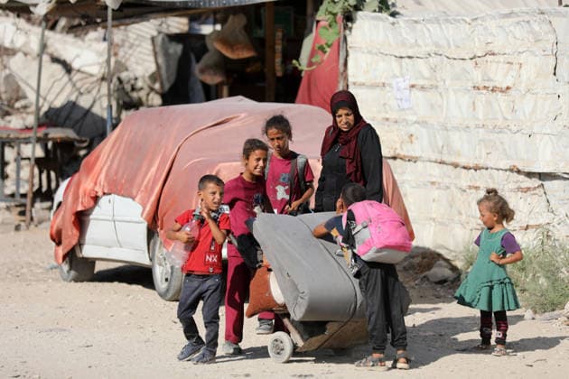 Displaced Palestinians leave tents in Gaza City’s al-Zeitoun neighborhood Displaced Palestinians carry their belongings as they leave their tents in the al-Zeitoun neighborhood of Gaza City on July 18, 2026. The departure follows the Israeli army’s expansion of the so-called Yellow Line, where its forces are deployed, through the placement of new concrete barriers and warnings of attacks in the area, in what residents described as a violation of the ceasefire. Photo by Bilal Osama apaimages Gaza city Gaza Strip Palestinian Territory 180726_Gaza_BO_02(38) Copyright: xapaimagesxBilalxOsamax xapaimagesx