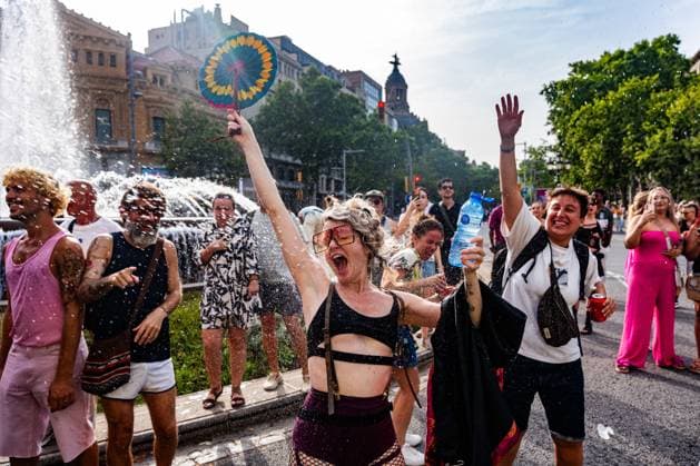 July 18, 2026, Barcelona, Spain: BARCELONA, SPAIN - JULY 18, 2026: Demonstrators march with flags and banners during the annual Pride parade to advocate for LGBTQ+ rights, sexual orientation equality, and transgender visibility. The mass mobilization brought together thousands of participants and civil rights organizations calling for stronger anti-discrimination laws and full legal protections for the gay, lesbian, and trans community across Europe. JNA Press Barcelona Spain - ZUMAq101 20260718_zna_q101_124 Copyright: xMarcxAsensioxClupesx