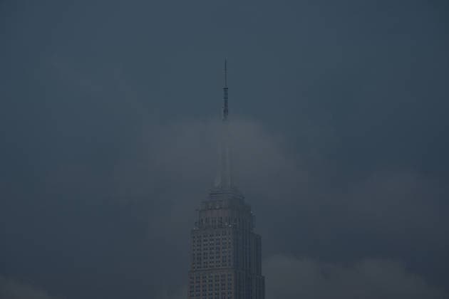 July 18, 2026, New York, New York, USA: Smoke from Canadian Wildfires hangs over the Empire State Building in Manhattan on July 18, 2026 in New York. More than 200 wildfires are burning in Canada causing smoke to drift across the United States spiking the air quality index. New York USA  - ZUMAb148 20260718_zap_b148_035 Copyright: xBryanxSmithx