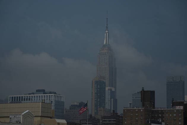 July 18, 2026, New York, New York, USA: Smoke from Canadian Wildfires hangs over the Empire State Building in Manhattan on July 18, 2026 in New York. More than 200 wildfires are burning in Canada causing smoke to drift across the United States spiking the air quality index. New York USA  - ZUMAb148 20260718_zap_b148_037 Copyright: xBryanxSmithx