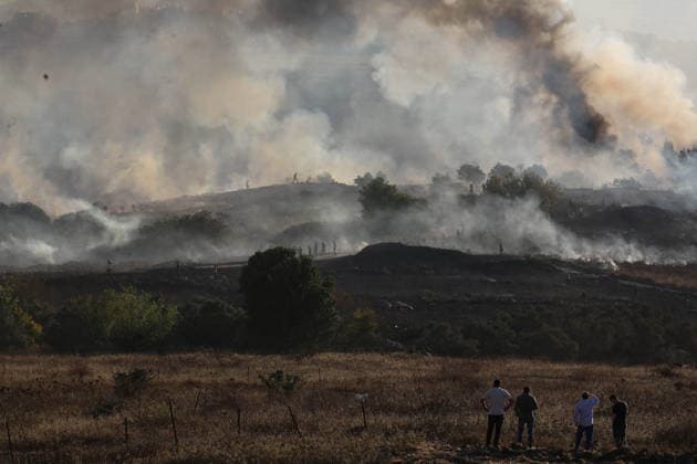 Israeli settlers set fire to Palestinian agricultural lands in Nablus village??????? NABLUS, WEST BANK, PALESTINE - JULY 18: Smoke rise as a large-scale fire burns through Palestinian agricultural lands in the village of Tel, south of Nablus in the West Bank, Palestine on July 18, 2026. A group of Israeli settlers deliberately set fire to the crop fields, forcing local Palestinian landowners to battle the fast-spreading flames with basic tools before emergency fire crews arrived to conduct ground and aerial firefighting operations to contain the blaze. Nedal Eshtayah Anadolu Nablus West Bank. Editorial use only. Please get in touch for any other usage.  Copyright: x2026xAnadoluxNedalxEshtayahx