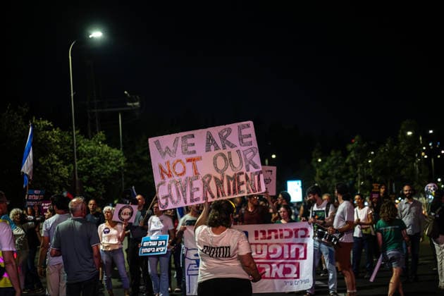 Protest against the Israeli government in West Jerusalem JERUSALEM - JULY 18: People carrying Israeli flags and anti-gov t banners stage a protest against the government of Israeli Prime Minister Benjamin Netanyahu, and call for an end to the attacks on Gaza and Lebanon, in West Jerusalem on July 18, 2026. Mostafa Alkharouf Anadolu Jerusalem Israel. Editorial use only. Please get in touch for any other usage.  Copyright: x2026xAnadoluxMostafaxAlkharoufx