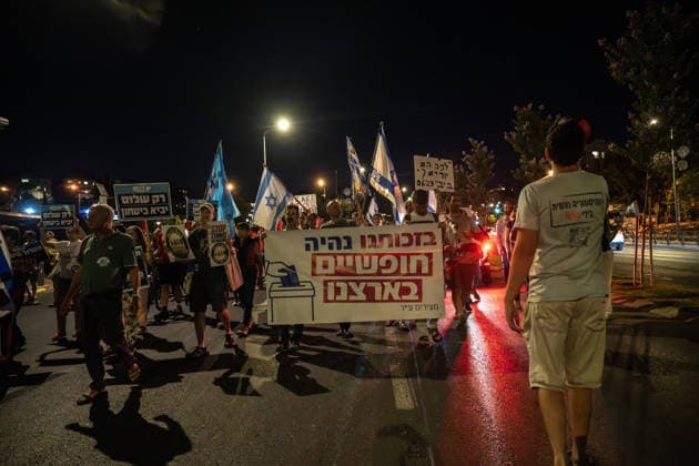 Protest against the Israeli government in West Jerusalem JERUSALEM - JULY 18: People carrying Israeli flags and anti-gov t banners stage a protest against the government of Israeli Prime Minister Benjamin Netanyahu, and call for an end to the attacks on Gaza and Lebanon, in West Jerusalem on July 18, 2026. Mostafa Alkharouf Anadolu Jerusalem Israel. Editorial use only. Please get in touch for any other usage.  Copyright: x2026xAnadoluxMostafaxAlkharoufx
