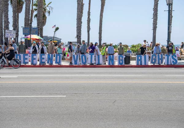 July 18, 2026, Santa Barbara, California, USA: People line the beach-side sidewalk of Cabrillo Boulevard at A Good Trouble Lives On rally to defend voting rights and to honor the legacy of the late civil rights leader and Congressman John Lewis. Santa Barbara USA  - ZUMAh13_ 20260718_zaf_h13_008 Copyright: xPJxHellerx