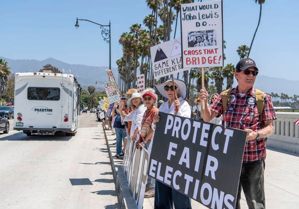 July 18, 2026, Santa Barbara, California, USA: People line the beach-side sidewalk of Cabrillo Boulevard at A Good Trouble Lives On rally to defend voting rights and to honor the legacy of the late civil rights leader and Congressman John Lewis. Santa Barbara USA  - ZUMAh13_ 20260718_zaf_h13_009 Copyright: xPJxHellerx