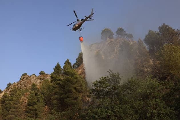 Forest fires continue on the Italian island of Sicily PALERMO, ITALY - JULY 18: A helicopter is dropping water to tackle a forest fire spreading across the slopes of Mount Iato near Palermo on the island of Sicily, Italy, on July 18, 2026, as ground and air crews continue their efforts to contain the blaze. Forest fires breaking out at various points on the island are continuing. Alberto Lo Bianco Anadolu Palermo Italy. Editorial use only. Please get in touch for any other usage.  Copyright: x2026xAnadoluxAlbertoxLoxBiancox