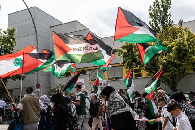 Pro-Palestinian demonstration in Berlin, Germany- 18 Jul 2026 A group of activists carrying Lebanese and Palestinian flags, some wearing keffiyehs, marches toward the former Tempelhof Airport during a pro-Palestinian demonstration. Hundreds of people marched through the city center with drums, some wearing keffiyehs, traditional Palestinian scarves, while calling for an end to the wars in the Gaza Strip and Iran. Berlin Germany Copyright: xVasilyxKrestyaninovx xSOPAxImagesx _VKR5122