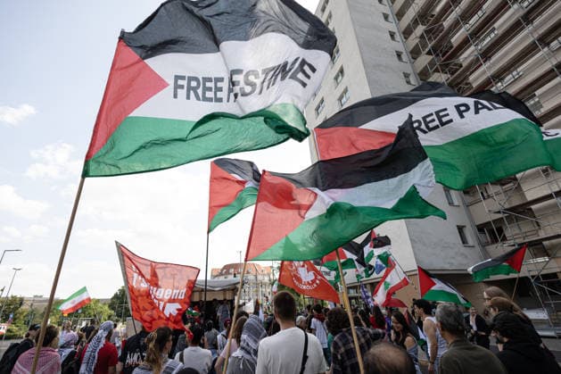 Pro-Palestinian demonstration in Berlin, Germany- 18 Jul 2026 Pro-Palestinian demonstrators carrying Palestinian flags and banners bearing the words Free Palestine march past a subway station toward the grounds of the former Tempelhof Airport. Hundreds of people marched through the city center with drums, some wearing keffiyehs, traditional Palestinian scarves, while calling for an end to the wars in the Gaza Strip and Iran. Berlin Germany Copyright: xVasilyxKrestyaninovx xSOPAxImagesx _VKR5216