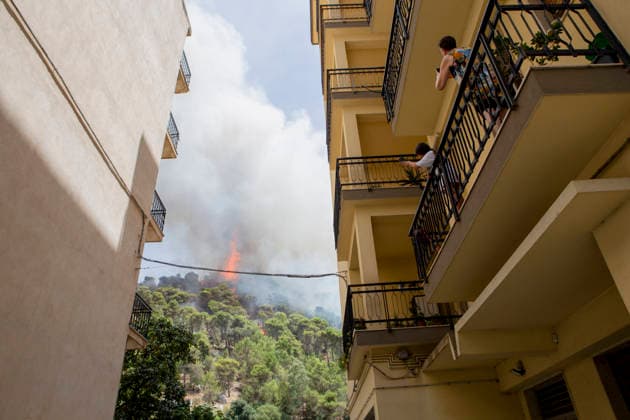 Wildfire Spreads Amid Heatwave in Sicily People film a wildfire from the balconies of an apartment building in Modica, Sicily, Italy, on July 18, 2026. Wildfires were reported in parts of Sicily as high temperatures persisted across the region. Modica Sicily Italy Copyright: xElvisxTakahashixMantellox