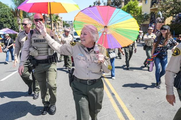 July 18, 2026, San Diego, California, Unted States: San Diego County Sheriff Kelly A. Martinez marches on the streets during the pride parade..The 2026 San Diego Pride Parade fills the streets of Hillcrest area with color, energy, and a powerful sense of community as thousands of people gather to celebrate LGBTQ+ pride and equality on July 18th, 2026, in San Diego, California. Participants wave rainbow flags, dance alongside decorated floats, and cheer for local organizations, businesses, and advocacy groups that march through the streets. Allies line the parade route, creating an atmosphere of joy while also recognizing Pride s roots in the fight for equal rights. San Diego Unted States  - ZUMAs197 20260718_aaa_s197_101 Copyright: xWaixLeexMichaelxHox