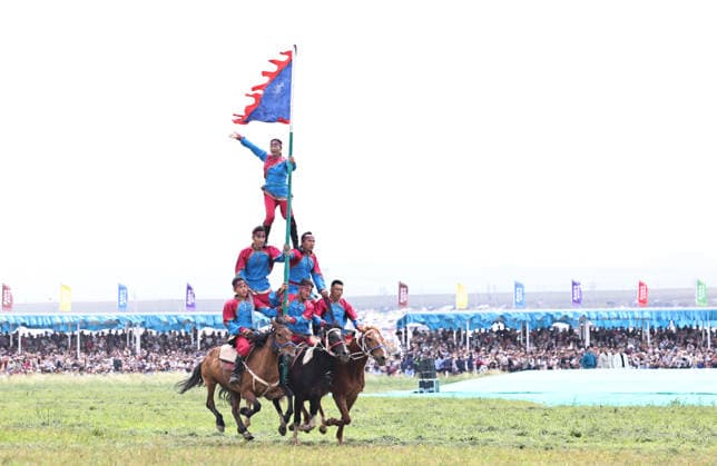 XILINGOL, CHINA - JULY 18: Artists perform on horseback at the opening ceremony of the 36th Naadam festival on July 18, 2026 in Xilingol League, Inner Mongolia Autonomous Region of China. The Naadam festival kicked off here on July 18. Naadam, usually held in mid-summer and sometimes in winter in pastoral areas of Inner Mongolia, means games in the Mongolian language. It often comprises wrestling, archery, and horse racing, also known as the Three Games of Men.  Copyright: xVCGx 111655158207