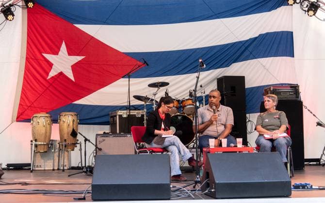Solidarity Gathering with Cuba Held in Berlin BERLIN, GERMANY JULY 18, 2026: People gather at Stadtpark Lichtenberg under the slogan Learn from Cuba, Fight for Cuba, Celebrate with Cuba during an event expressing solidarity with the Caribbean nation. Participants called for an end to the United States embargo and international sanctions, which organisers said have contributed to decades of economic hardship in Cuba. Berlin Germany Copyright: x xAndrÃ sxTrujillox xJNAxPressx