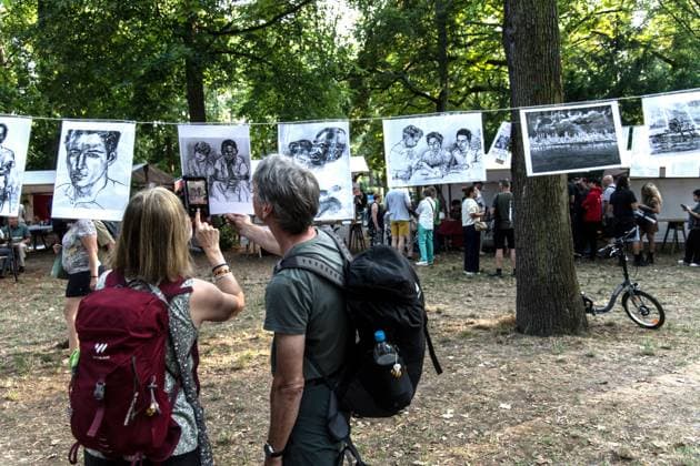 Solidarity Gathering with Cuba Held in Berlin BERLIN, GERMANY JULY 18, 2026: People gather at Stadtpark Lichtenberg under the slogan Learn from Cuba, Fight for Cuba, Celebrate with Cuba during an event expressing solidarity with the Caribbean nation. Participants called for an end to the United States embargo and international sanctions, which organisers said have contributed to decades of economic hardship in Cuba. Berlin Germany Copyright: x xAndrÃ sxTrujillox xJNAxPressx