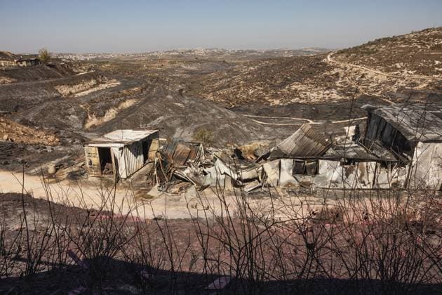 Major wildfire destroys homes near Havat Gilad in the West Bank HAVAT GILAD, WEST BANK JULY 19, 2026: Firefighters battle a wildfire near Havat Gilad in the occupied West Bank after a blaze rapidly spread through dry vegetation, destroying about 30 structures, including homes and businesses. Israeli authorities said they were investigating the incident as a suspected nationalist-motivated arson attack after a person allegedly threw a burning object from a moving vehicle. Two emergency responders were injured. West Bank, Havat Gilad PS Copyright: x xHilelxbenxorx xJNAxPressx