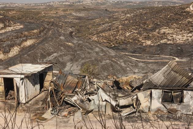 Major wildfire destroys homes near Havat Gilad in the West Bank HAVAT GILAD, WEST BANK JULY 19, 2026: Firefighters battle a wildfire near Havat Gilad in the occupied West Bank after a blaze rapidly spread through dry vegetation, destroying about 30 structures, including homes and businesses. Israeli authorities said they were investigating the incident as a suspected nationalist-motivated arson attack after a person allegedly threw a burning object from a moving vehicle. Two emergency responders were injured. West Bank, Havat Gilad PS Copyright: x xHilelxbenxorx xJNAxPressx