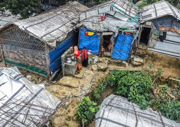 Monsoon rains heighten landslide risks in Rohingya refugee camps COX S BAZAR, BANGLADESH JULY 19, 2026: Rohingya refugees live in makeshift shelters on steep hillsides at a refugee camp in Cox s Bazar during the monsoon season. Heavy rainfall increases the risk of landslides and flooding, while muddy conditions, damaged infrastructure and limited access to clean water and sanitation pose additional health and safety challenges for hundreds of thousands of displaced residents. Cox s Bazar Bangladesh Copyright: x xMdxshamimxUlxislamx xJNAxPressx