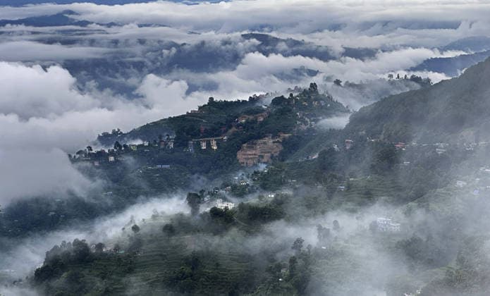 July 19, 2026, Kathmandu, Nepal: A mesmerizing view of a misty morning unfolds after continuous rainfall, as low-lying clouds drape the surrounding hills in a serene monsoon landscape in Dhulikhel, Kavrepalanchok, on the outskirts of Kathmandu, Nepal, on July 19, 2026. Kathmandu Nepal  - ZUMAs233 20260719_zap_s233_001 Copyright: xSunilxSharmax