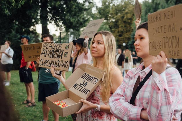 July 18, 2026, Dnipro, Dnipropetrovsk Oblast, Ukraine: Demonstrators holding banners rallied to protest the resignation of Ukrainian Defence Minister Mykhailo Fedorov. After President Zelenskyy announced a government reshuffle on July 12, Defence Minister Mykhailo Fedorov resigned on July 15. His departure triggered nationwide protests, with crowds urging the President to keep Fedorov in office. Dnipro Ukraine  - ZUMAp259 20260718_zip_p259_017 Copyright: xDenxPolyakovx