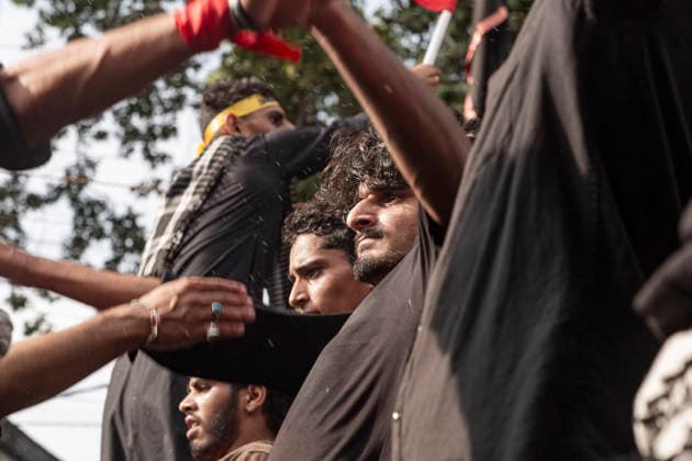 July 19, 2026, Budgam, Jammu And Kashmir, India: Shiite Muslims beat their chests as they take part in a religious procession on the fourth day of Safar in Magam. Safar, the second month of the Islamic calendar, follows Muharram and continues the mourning of Imam Hussain. According to Shia tradition, the 4th of safar, 61 AH, marks the imprisonment of the Prophet s household (Ahl al-Bayt) in Kufa under the orders of Ubaydullah ibn Ziyad after the Battle of Karbala. Budgam India  - ZUMAa205 20260719_zip_a205_010 Copyright: xAdilxAbassx