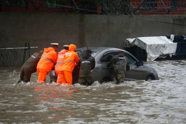 Monsoon Rains Inundate Roads In Central Kathmandu Commuters wade through a waterlogged road after heavy monsoon rainfall inundated the Maitighar Mandala area in Kathmandu, Nepal, on July 19, 2026. Continuous rain caused localized flooding and disrupted traffic and daily life in several parts of the capital, with pedestrians and motorists navigating through floodwaters as the monsoon season continues. Kathmandu Nepal  Copyright: xSanjitxPariyarx originalFilename: pariyar-notitle260719_npJaf.jpg