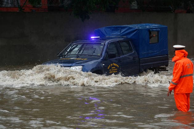 Monsoon Rains Inundate Roads In Central Kathmandu Commuters wade through a waterlogged road after heavy monsoon rainfall inundated the Maitighar Mandala area in Kathmandu, Nepal, on July 19, 2026. Continuous rain caused localized flooding and disrupted traffic and daily life in several parts of the capital, with pedestrians and motorists navigating through floodwaters as the monsoon season continues. Kathmandu Nepal  Copyright: xSanjitxPariyarx originalFilename: pariyar-notitle260719_npcAS.jpg