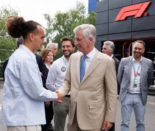 Belgium s Red Devils soccer player Arthur Theate, Vice-president of the Societe Spa Grand Prix Georges-Louis Bouchez, King Philippe - Filip of Belgium and Belgian Foreign Minister Maxime Prevot pictured during a royal visit to the Grand Prix F1 of Belgium race, in Spa-Francorchamps, Sunday 19 July 2026. The Spa-Francorchamps Formula One Grand Prix takes place this weekend, from July 17th to July 19th.  BENOITxDOPPAGNE 181486756